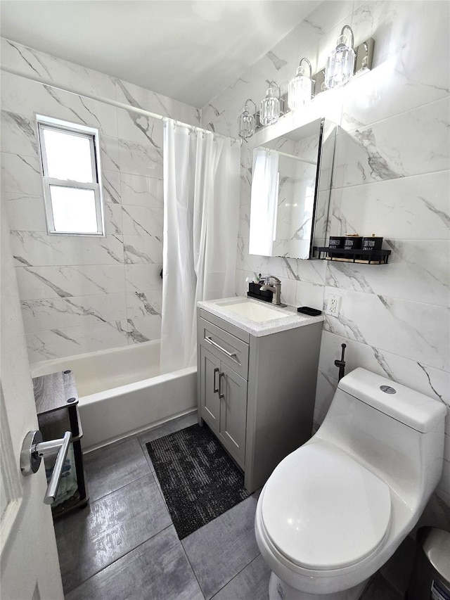 89-25 Shore Pkwy Unit 1L, Howard Beach, NY 11414 - full bathroom with toilet, vanity, shower / bathtub combination with curtain, and tile walls