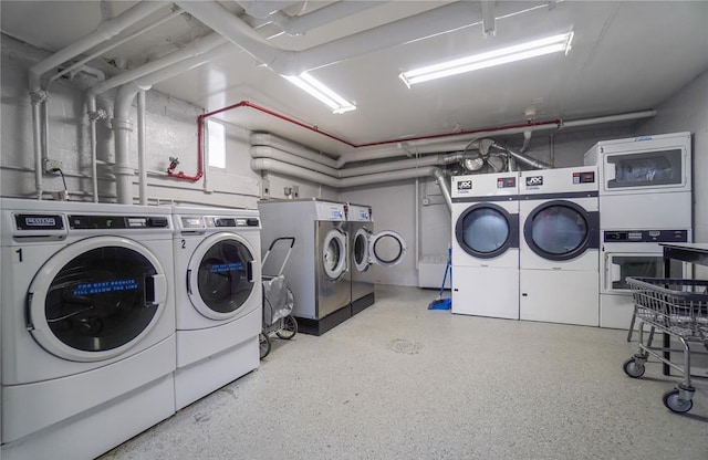 89-25 Shore Pkwy Unit 1L, Howard Beach, NY 11414 - communal laundry room with washer and clothes dryer and stacked washing machine and dryer