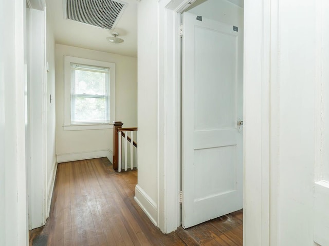 3 3rd St, Glenwood Landing, NY 11547 - hallway featuring an upstairs landing, hardwood / wood-style flooring, and baseboards