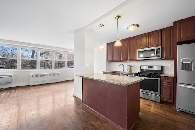 880 Boynton Ave Unit 1K, Bronx, NY 10473 - kitchen featuring stainless steel appliances, radiator heating unit, baseboards, dark wood-style flooring, and light stone countertops