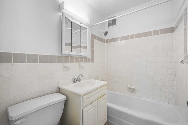 880 Boynton Ave Unit 1K, Bronx, NY 10473 - full bathroom featuring toilet, vanity, shower / bathtub combination, and tile walls