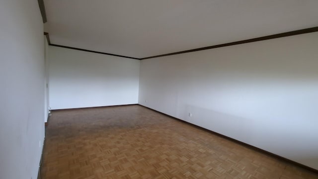 16 Rockledge Ave Unit 5B1, Ossining, NY 10562 - empty room featuring baseboards and ornamental molding