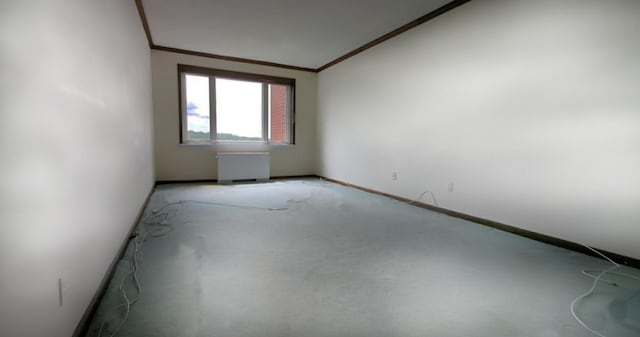 16 Rockledge Ave Unit 5B1, Ossining, NY 10562 - empty room with crown molding, radiator heating unit, and baseboards