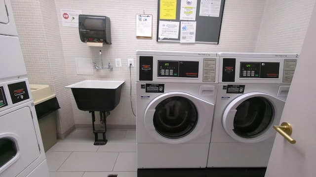 16 Rockledge Ave Unit 5B1, Ossining, NY 10562 - shared laundry with washer and dryer and tile patterned floors