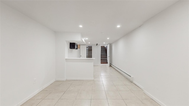 596 Terrace Pl, Baldwin, NY 11510 - unfurnished room featuring a baseboard radiator, recessed lighting, light tile patterned floors, stairway, and baseboards