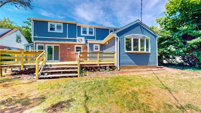 596 Terrace Pl, Baldwin, NY 11510 - back of house with a deck, a lawn, and a cooling unit