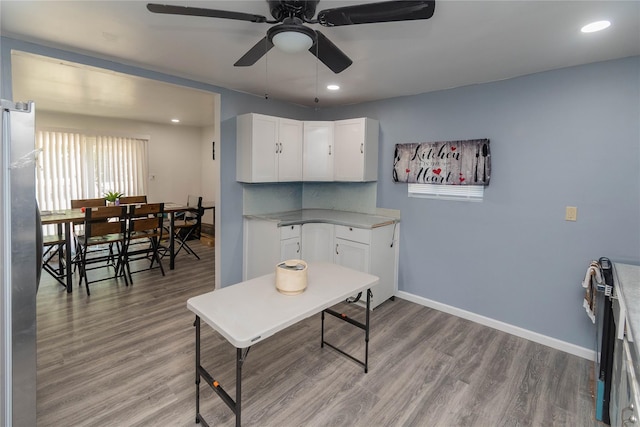 750 Irish Cape Rd, Ellenville, NY 12428 - kitchen featuring light wood-style floors, baseboards, white cabinetry, a ceiling fan, and recessed lighting