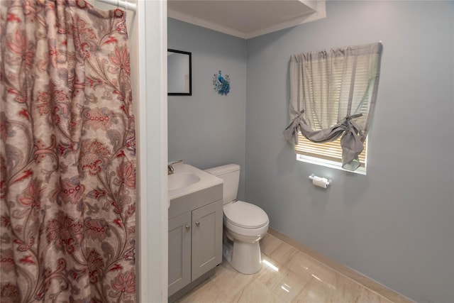 750 Irish Cape Rd, Ellenville, NY 12428 - full bath featuring toilet, vanity, ornamental molding, curtained shower, and baseboards