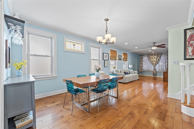 70-27 Olcott St, Forest Hills, NY 11375 - dining room featuring a chandelier, ornamental molding, light wood finished floors, ceiling fan, and recessed lighting