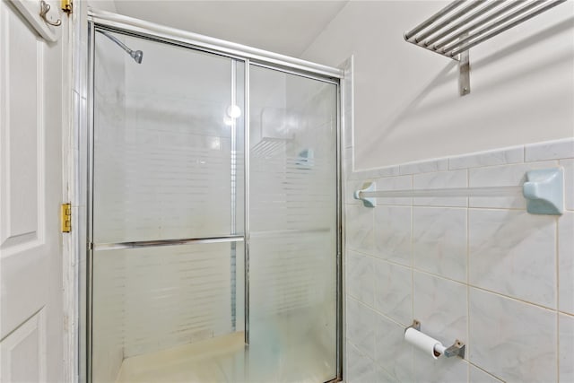 70-27 Olcott St, Forest Hills, NY 11375 - bathroom featuring a shower stall