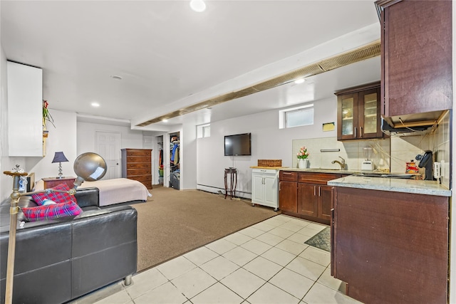 70-27 Olcott St, Forest Hills, NY 11375 - kitchen with recessed lighting, open floor plan, light carpet, glass insert cabinets, and backsplash