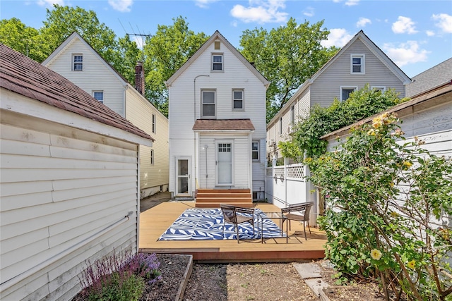 70-27 Olcott St, Forest Hills, NY 11375 - rear view of property featuring a wooden deck