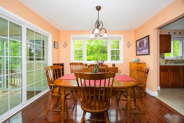 90 Fieldstone Blvd, Wappingers Falls, NY 12590 - dining area featuring dark wood-style floors, healthy amount of natural light, and baseboards