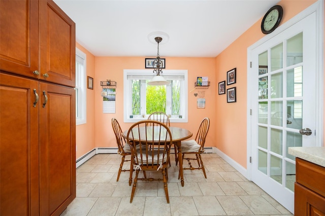 90 Fieldstone Blvd, Wappingers Falls, NY 12590 - dining space with baseboards and a baseboard heating unit