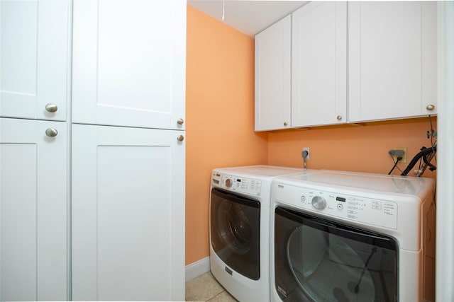 90 Fieldstone Blvd, Wappingers Falls, NY 12590 - washroom featuring cabinet space, washer and clothes dryer, baseboards, and light tile patterned floors