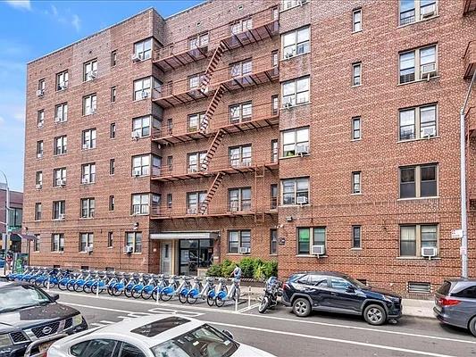 4035 Ithaca St Unit 6F, Elmhurst, NY 11373 - view of apartment building / complex featuring cooling unit