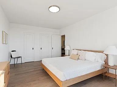 4035 Ithaca St Unit 6F, Elmhurst, NY 11373 - bedroom featuring wood finished floors