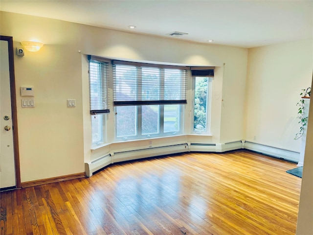 24 Gaymor Ln, Commack, NY 11725 - unfurnished room featuring hardwood / wood-style flooring, baseboards, and recessed lighting