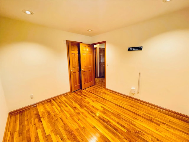 24 Gaymor Ln, Commack, NY 11725 - spare room featuring light wood-style flooring, recessed lighting, and baseboards