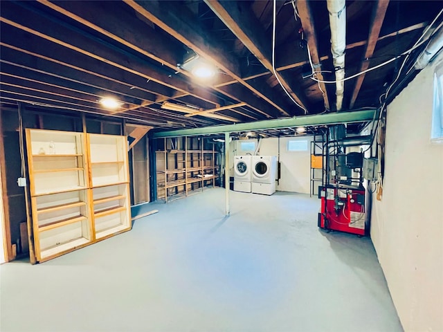 24 Gaymor Ln, Commack, NY 11725 - basement with washing machine and dryer and a heating unit