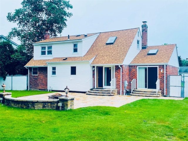 24 Gaymor Ln, Commack, NY 11725 - rear view of property with brick siding, a patio, entry steps, a chimney, and a shingled roof