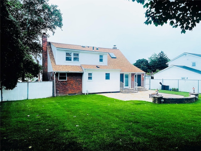 24 Gaymor Ln, Commack, NY 11725 - rear view of property with a patio, a chimney, entry steps, brick siding, and a shingled roof