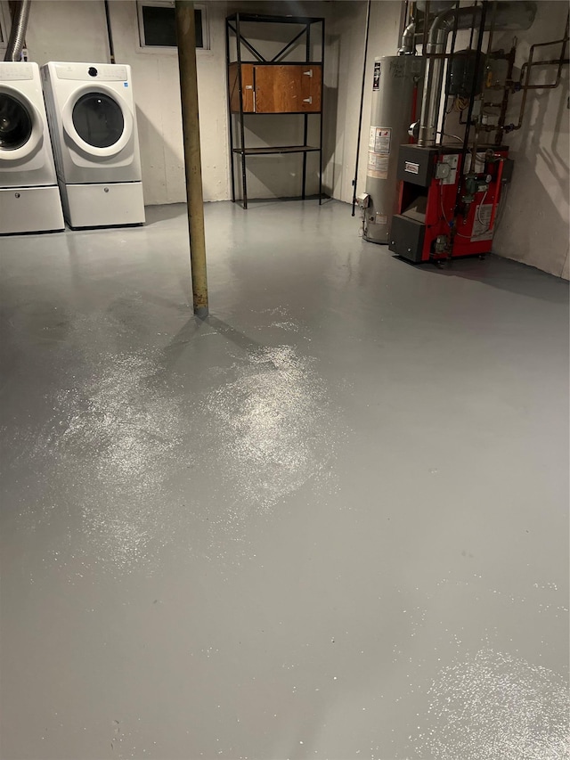 24 Gaymor Ln, Commack, NY 11725 - unfinished below grade area featuring washing machine and clothes dryer, gas water heater, and a heating unit
