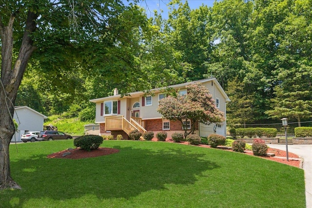 15 Mari Rd, Chester, NY 10918 - raised ranch with a chimney and brick siding