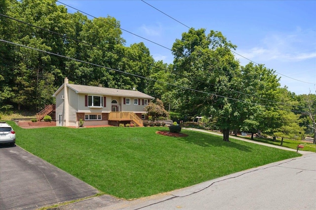 15 Mari Rd, Chester, NY 10918 - bi-level home with a front yard, a chimney, and asphalt driveway