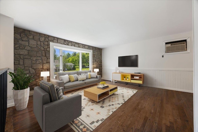 15 Mari Rd, Chester, NY 10918 - living area with an AC wall unit, wood finished floors, and wainscoting