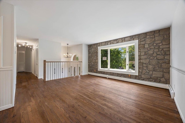 15 Mari Rd, Chester, NY 10918 - spare room with a chandelier, a baseboard heating unit, and wood finished floors