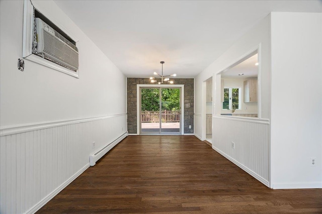 15 Mari Rd, Chester, NY 10918 - unfurnished dining area featuring baseboard heating, a chandelier, dark wood-style floors, and a wainscoted wall