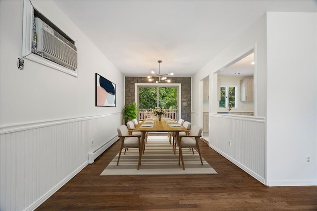 15 Mari Rd, Chester, NY 10918 - dining space with a baseboard radiator, a chandelier, dark wood-style floors, and wainscoting