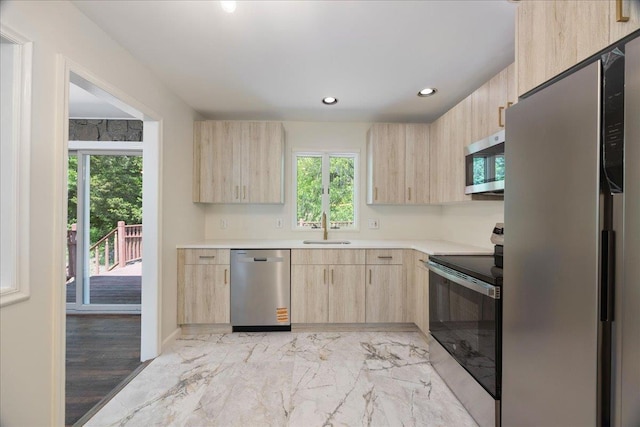 15 Mari Rd, Chester, NY 10918 - kitchen featuring light brown cabinetry, stainless steel appliances, a sink, light countertops, and plenty of natural light
