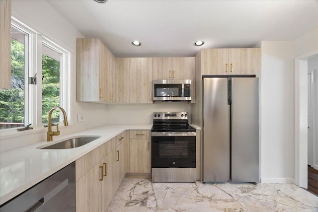 15 Mari Rd, Chester, NY 10918 - kitchen featuring light brown cabinets, stainless steel appliances, a sink, light marble finish flooring, and recessed lighting