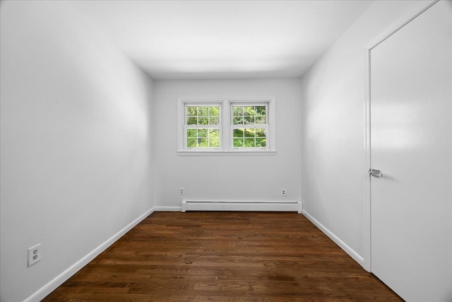 15 Mari Rd, Chester, NY 10918 - spare room featuring baseboard heating, dark wood-style flooring, and baseboards