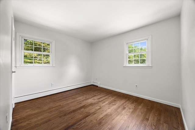 15 Mari Rd, Chester, NY 10918 - spare room with baseboard heating, wood finished floors, and baseboards