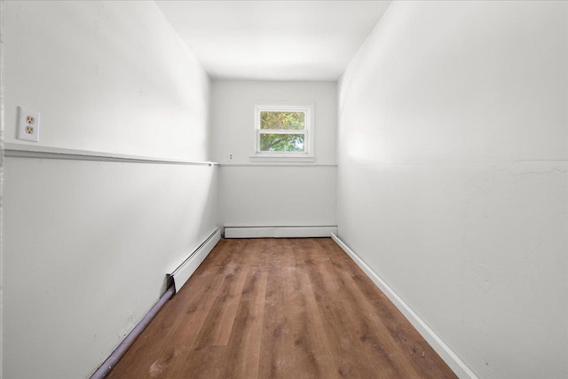 15 Mari Rd, Chester, NY 10918 - unfurnished room featuring a baseboard radiator, wood finished floors, and baseboards