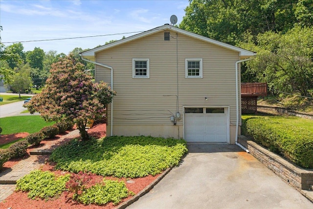 15 Mari Rd, Chester, NY 10918 - view of side of home featuring driveway and a garage