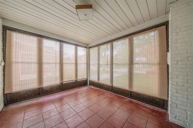 155 Carman Ave, East Rockaway, NY 11518 - unfurnished sunroom with tile patterned floors and wood ceiling