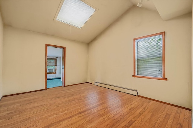155 Carman Ave, East Rockaway, NY 11518 - empty room featuring baseboard heating, attic access, light wood-style floors, baseboards, and lofted ceiling