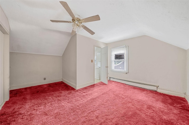 155 Carman Ave, East Rockaway, NY 11518 - bonus room featuring a baseboard heating unit, lofted ceiling, a ceiling fan, carpet, and baseboards
