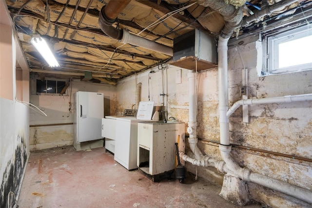 155 Carman Ave, East Rockaway, NY 11518 - below grade area featuring washer / clothes dryer and freestanding refrigerator