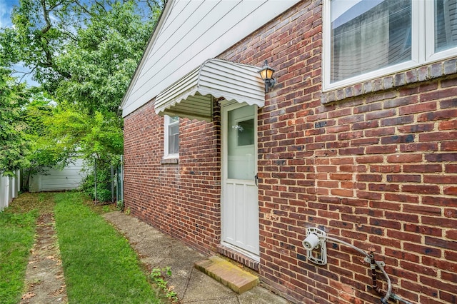 155 Carman Ave, East Rockaway, NY 11518 - entrance to property with brick siding