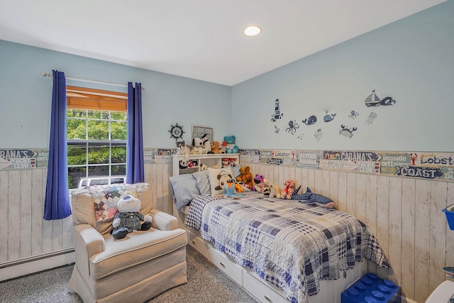 14 Arlington St, Patchogue, NY 11772 - bedroom featuring wooden walls, baseboard heating, and recessed lighting