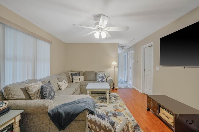 14 Arlington St, Patchogue, NY 11772 - living area with a ceiling fan and light wood-type flooring