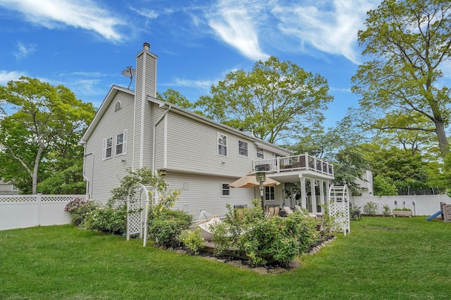 14 Arlington St, Patchogue, NY 11772 - back of house featuring a deck and a chimney