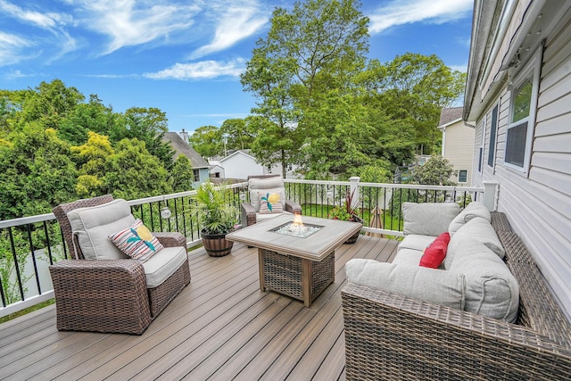 14 Arlington St, Patchogue, NY 11772 - wooden deck with an outdoor living space with a fire pit
