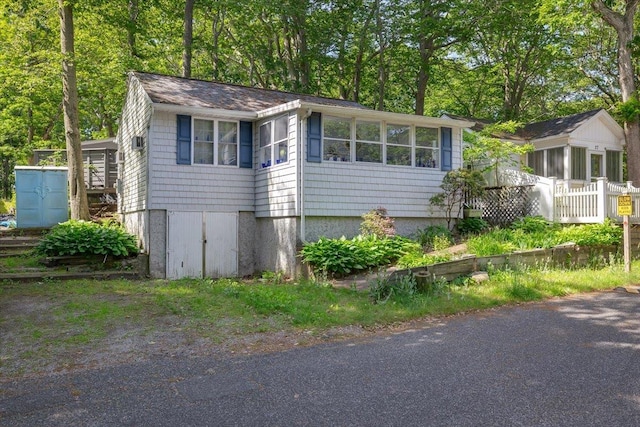 25 Cottage Rd, Baiting Hollow, NY 11933 - view of front of home with a sunroom