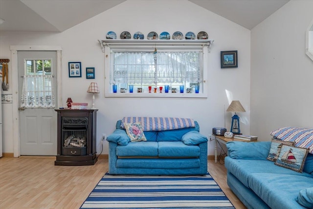25 Cottage Rd, Baiting Hollow, NY 11933 - living room featuring lofted ceiling, wood finished floors, and baseboards